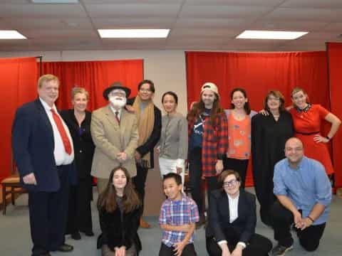 a group of people posing for a photo