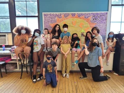 a group of people posing for a photo