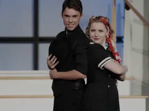a man and woman posing for a picture