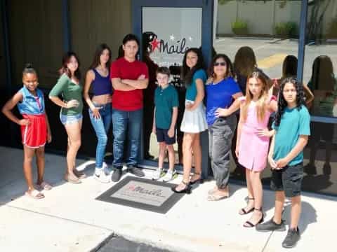 a group of people posing for a photo