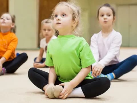 a group of children sitting on the floor