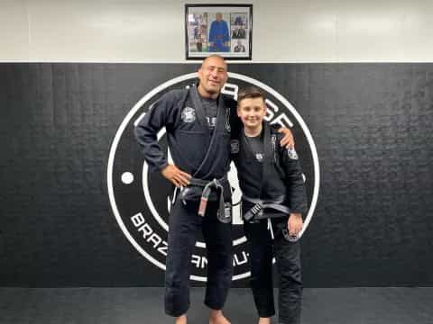 a man and a boy posing for a picture