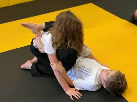 a man and a woman lying on the floor