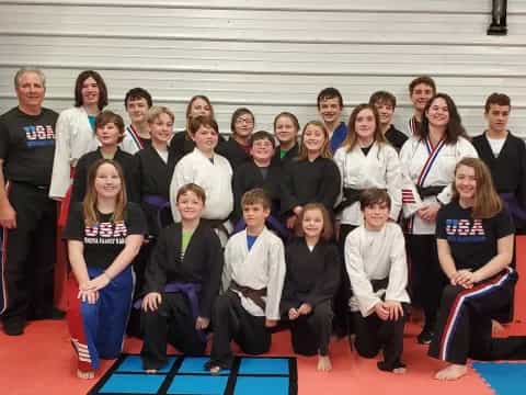a group of people posing for a photo