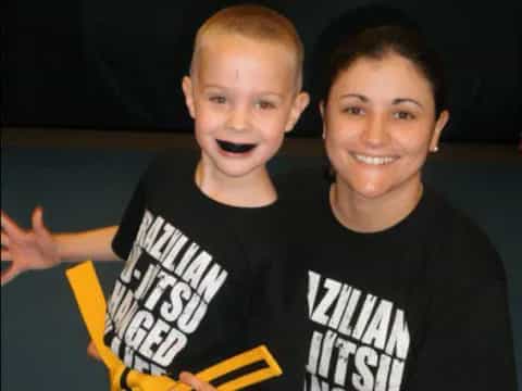 a person and a boy posing for a picture