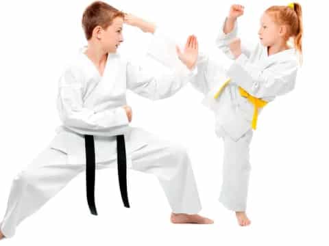 a man and a woman in karate uniforms