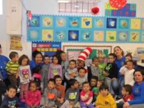 a group of children posing for a photo