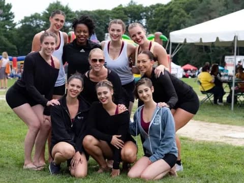 a group of women posing for a photo