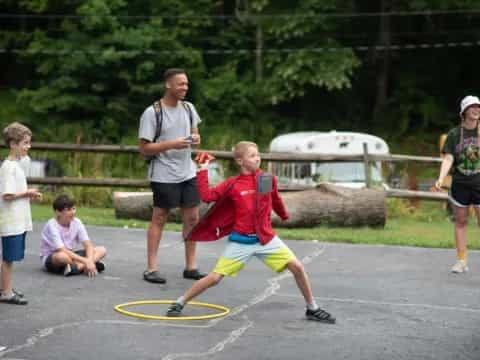 a group of people playing with a rope