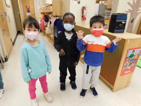 a group of children wearing clothing