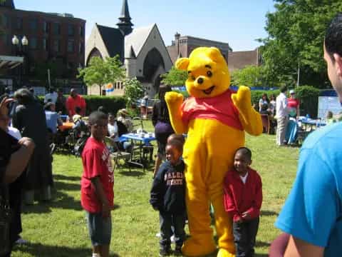a person in a garment with children