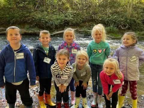a group of children posing for a photo