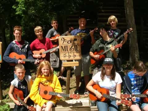 a group of people holding instruments