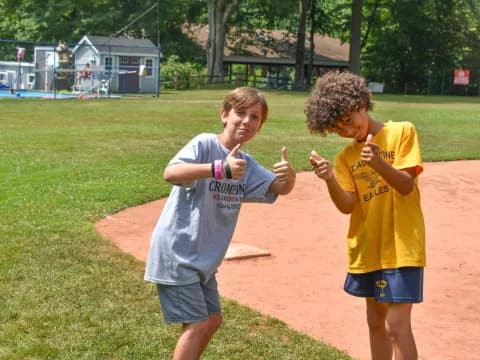a couple of boys posing for the camera